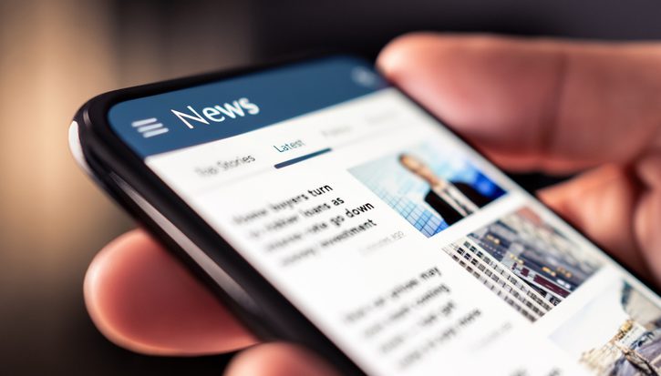 Reading news online on phone