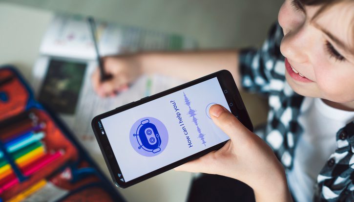 A girl doing schoolwork talking to an AI chat bot on her phone