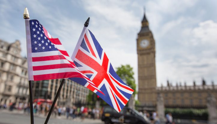 Union Jack flag and the Stars and Stripes flag of the USA, fluttering together in front of Big Ben in Westminster